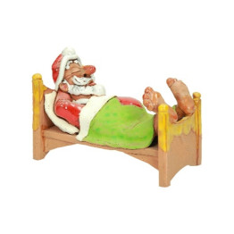 Müder Weihnachtsmann im Bett | Keramik-Räucherfigur | momolio.de